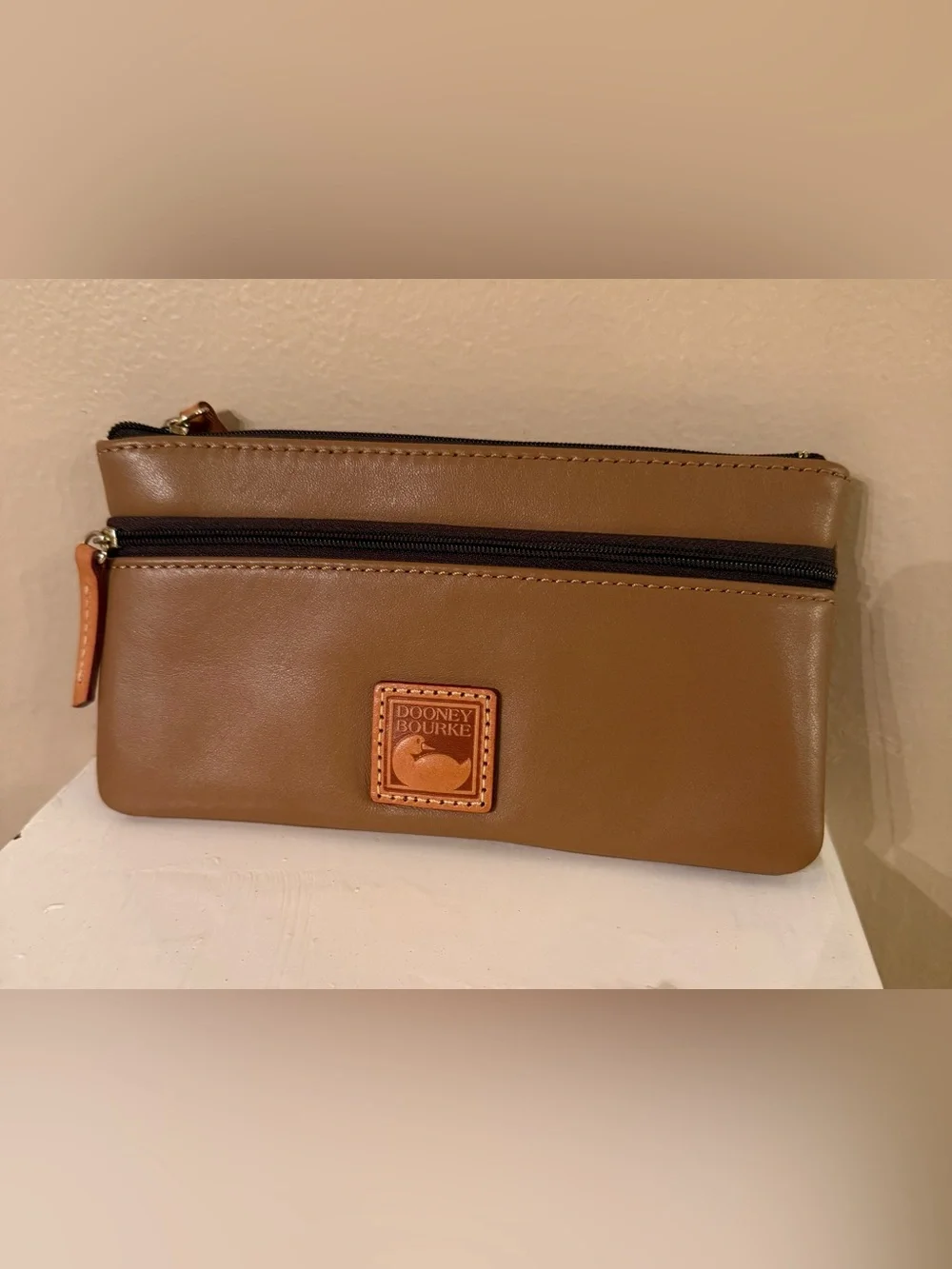 Dooney & Bourke double-zip leather pouch/wristlet EUC